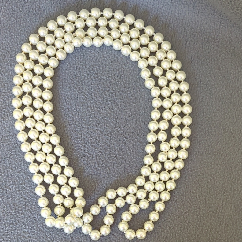 4 Foot Strand Of Faux Pearls.